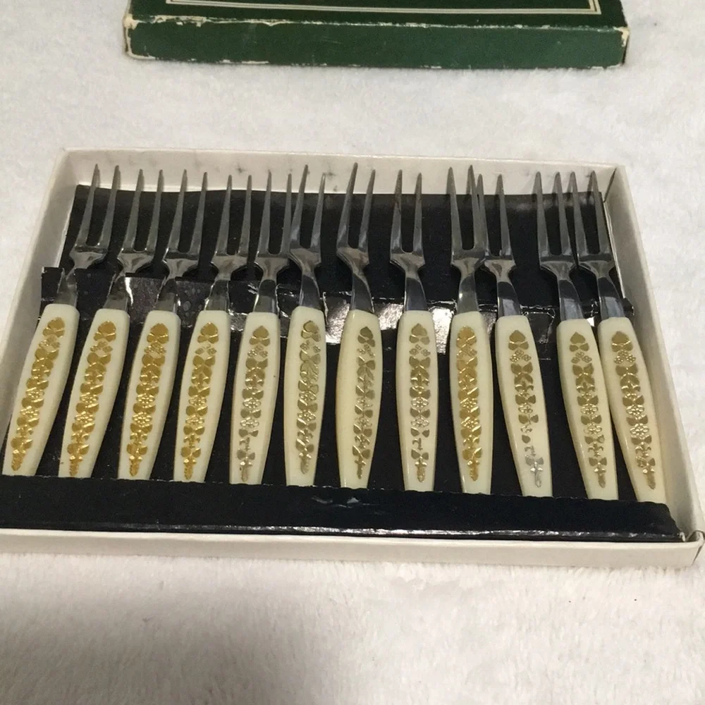 Mini stainless steel forks set of twelve in original box. Vintage